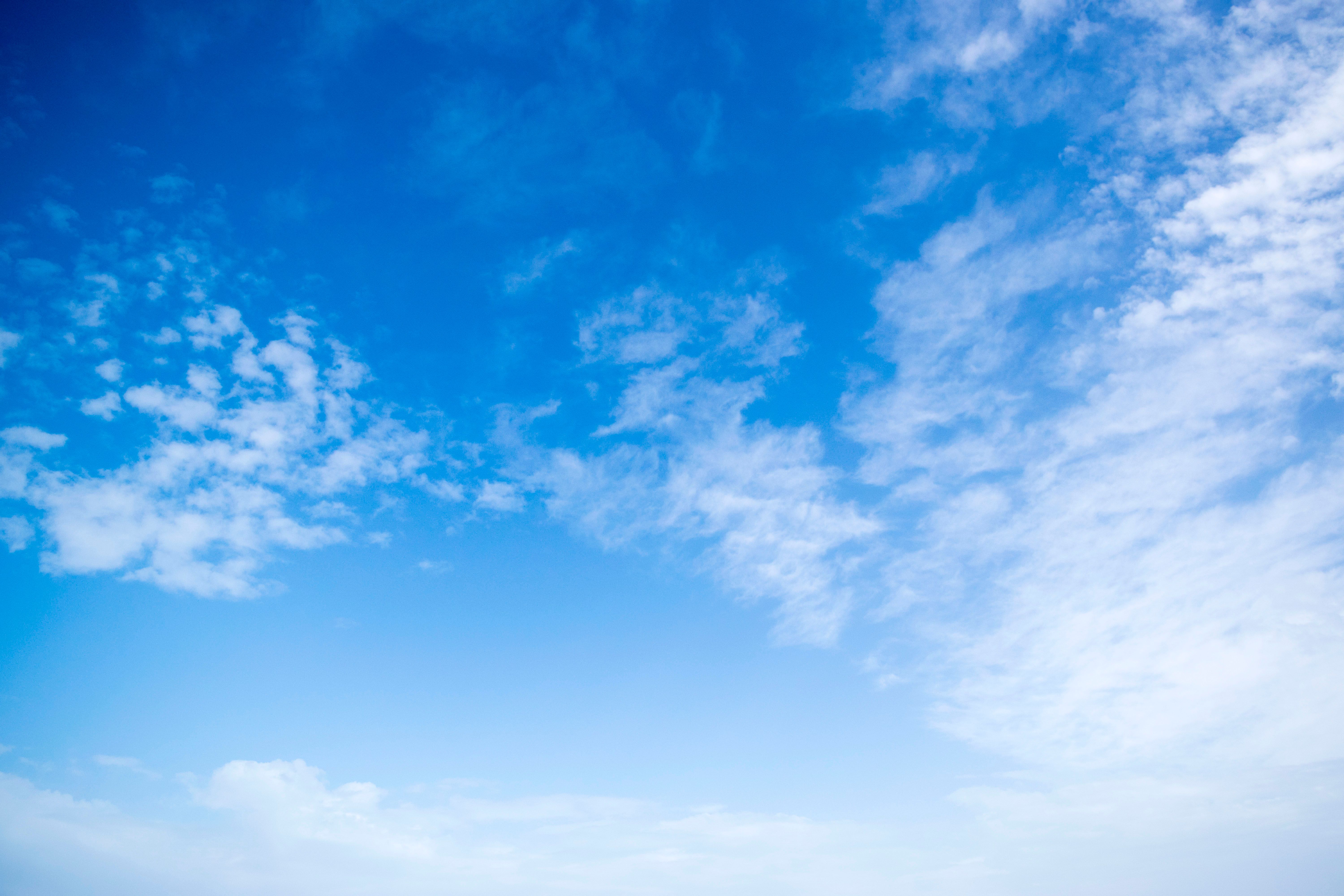 Airplane flying above clouds